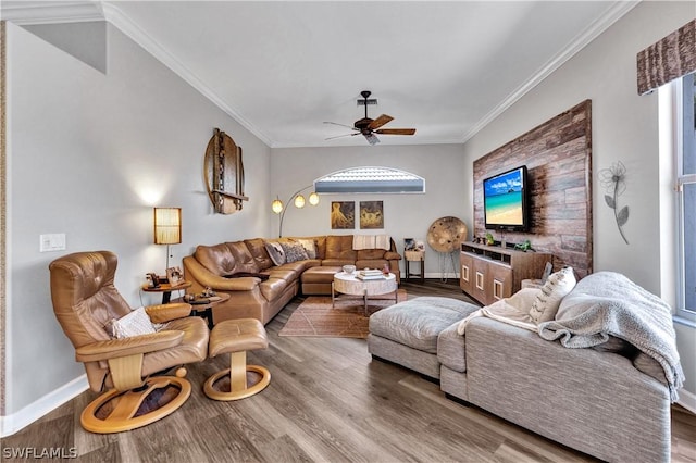 living room with ceiling fan, ornamental molding, and wood-type flooring