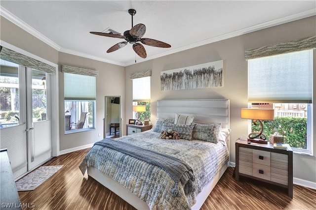 bedroom with multiple windows, dark wood-type flooring, and ornamental molding