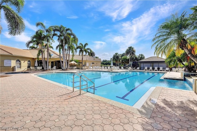 view of swimming pool featuring a patio area