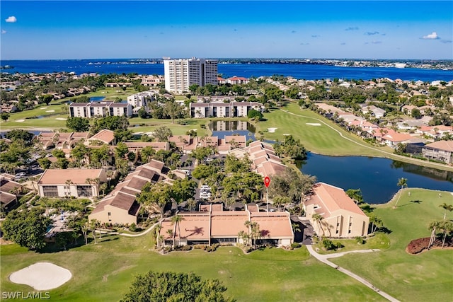 drone / aerial view with a water view