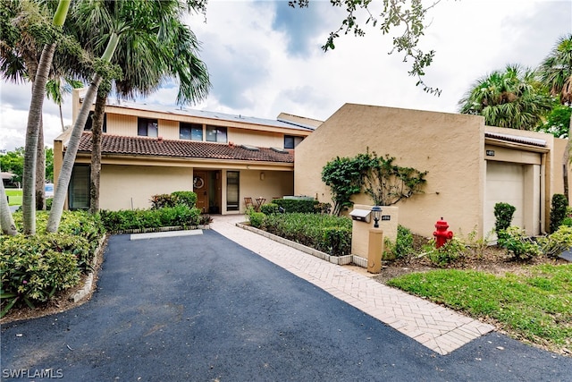 view of front of house with a garage