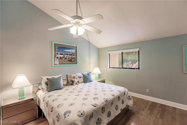 bedroom featuring hardwood / wood-style flooring, vaulted ceiling, and ceiling fan