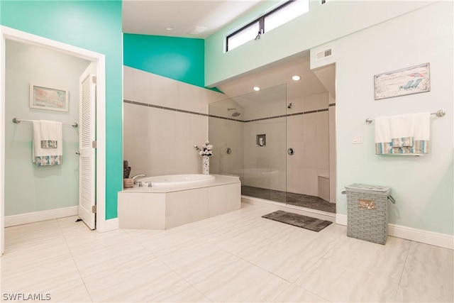 bathroom with independent shower and bath