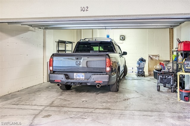 garage with a carport