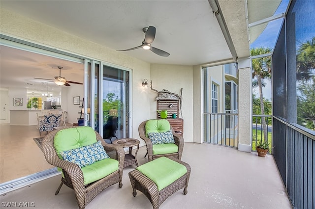 view of patio / terrace featuring ceiling fan