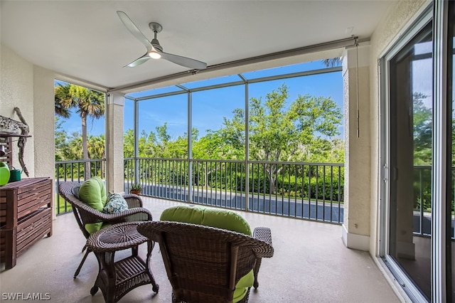 sunroom / solarium with ceiling fan