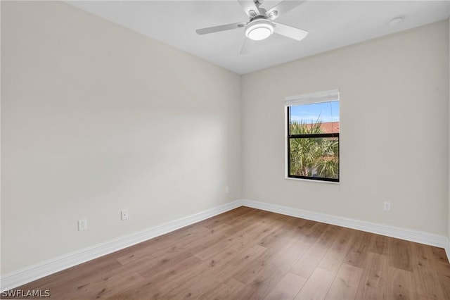 unfurnished room featuring ceiling fan and light hardwood / wood-style flooring