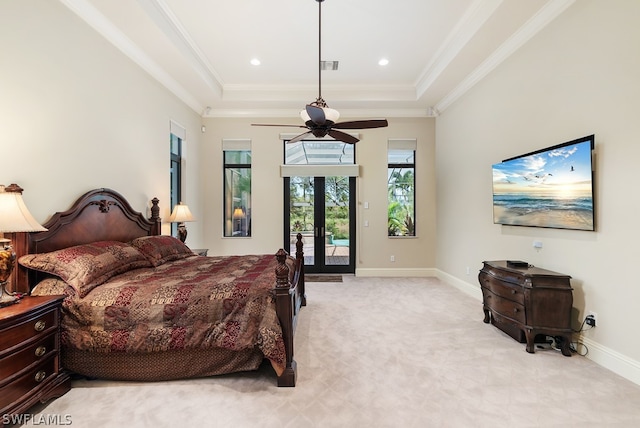 bedroom with access to outside, french doors, light carpet, a tray ceiling, and ceiling fan