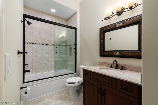 20180 Riverbrooke Run, Estero, FL 33928 - bathroom featuring vanity and combined bath / shower with glass door