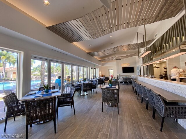 dining area with hardwood / wood-style flooring