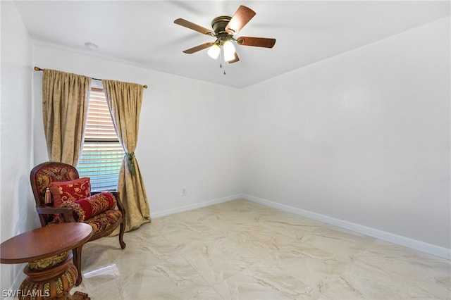 living area featuring tile patterned floors and ceiling fan