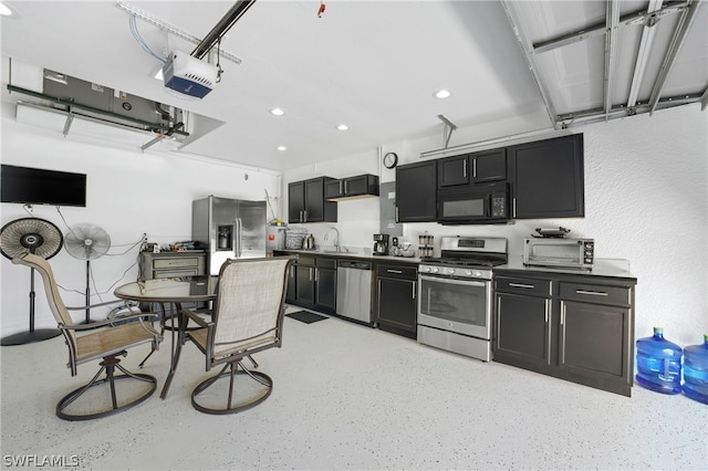 kitchen with appliances with stainless steel finishes and sink