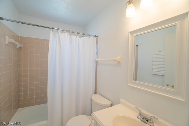 full bathroom with vanity, toilet, and shower / tub combo