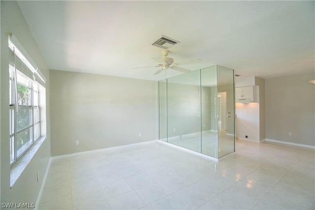 unfurnished bedroom with a closet and ceiling fan