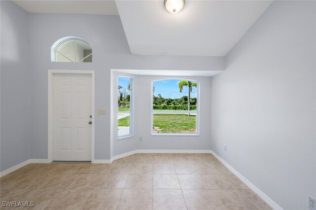 entrance foyer with light tile patterned floors