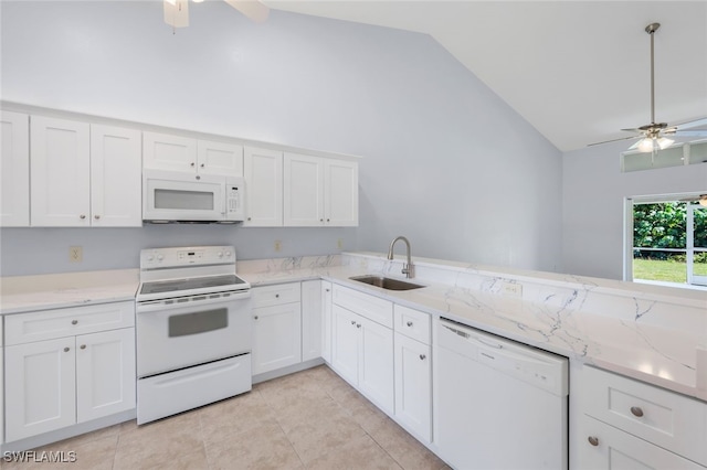 kitchen featuring sink, light tile patterned floors, white appliances, ceiling fan, and white cabinets