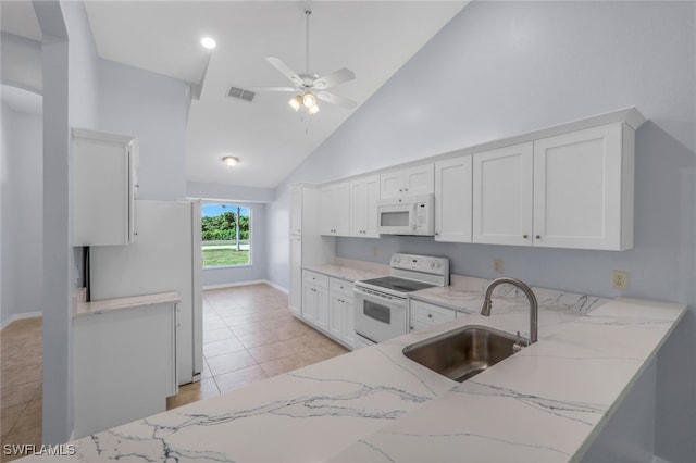 kitchen featuring sink, high vaulted ceiling, light stone counters, white appliances, and ceiling fan