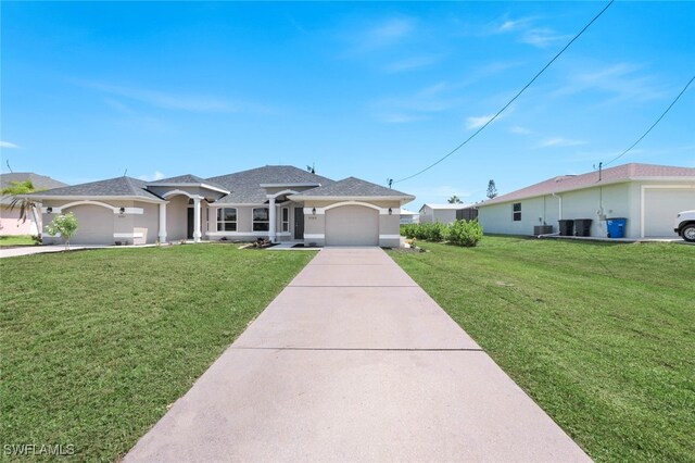 single story home with a garage, central air condition unit, and a front lawn