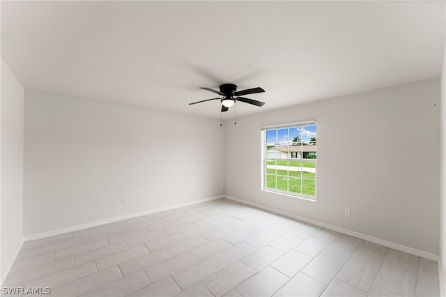 empty room featuring ceiling fan