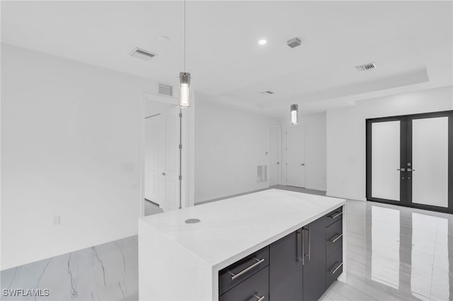 bar featuring hanging light fixtures and french doors