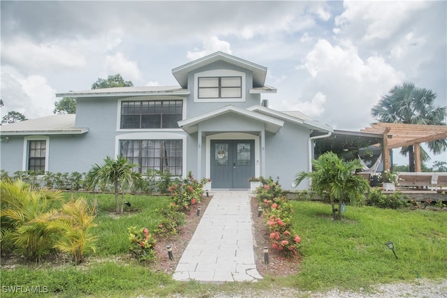 view of front of property with a front lawn