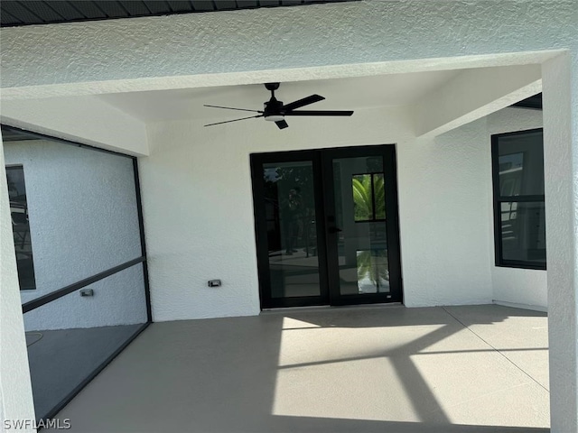 view of patio / terrace featuring french doors and ceiling fan