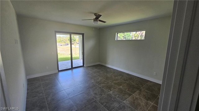 empty room featuring ceiling fan