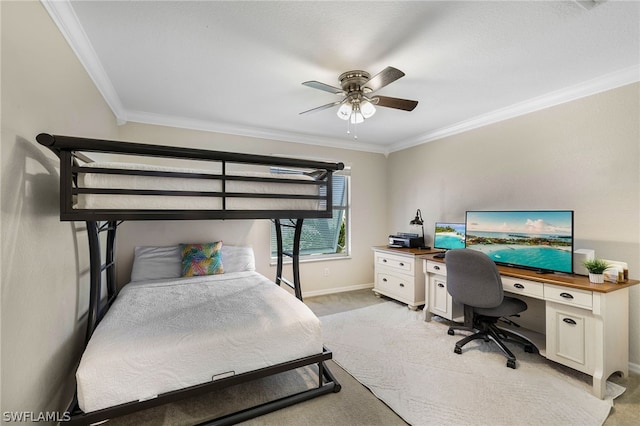 bedroom with ornamental molding, light colored carpet, and ceiling fan