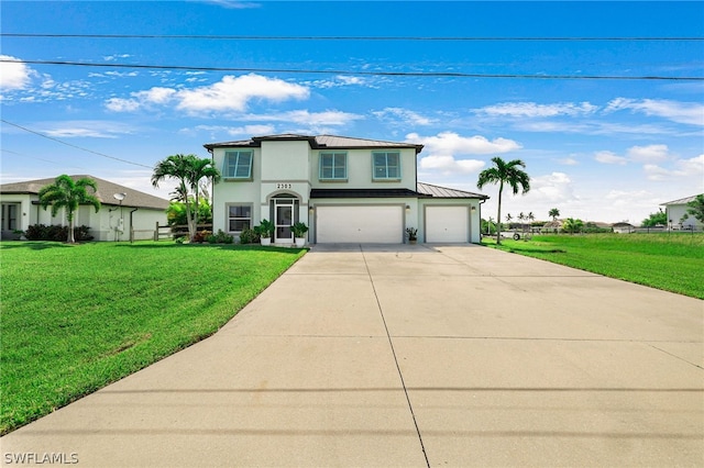 view of front facade featuring a garage and a front lawn