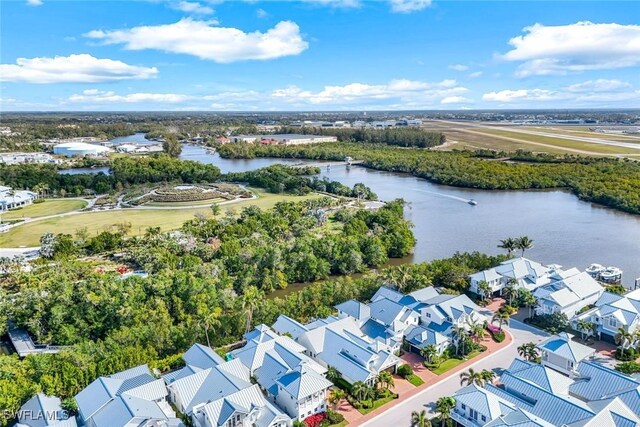 birds eye view of property featuring a residential view and a water view