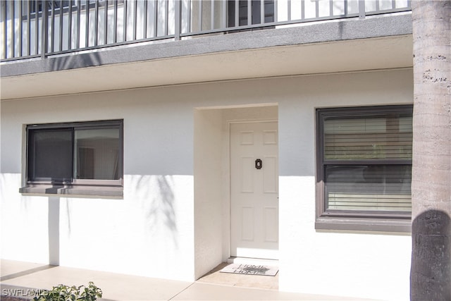 doorway to property with a balcony