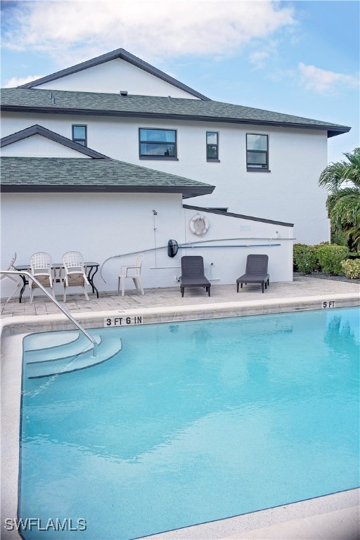 view of pool with a patio area