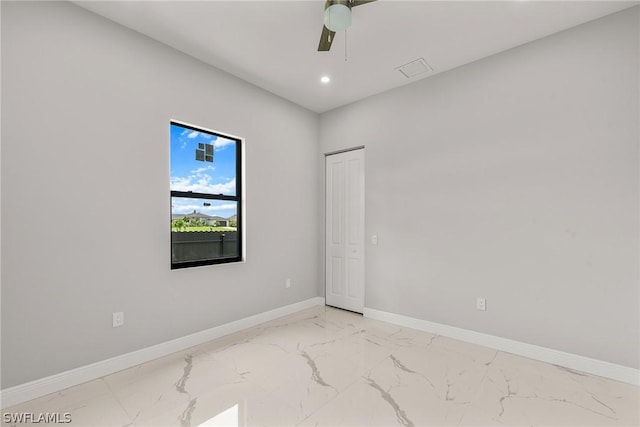 empty room featuring ceiling fan