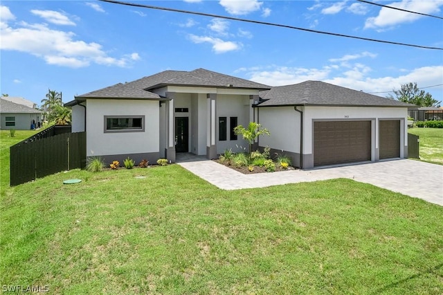 prairie-style house with a front lawn and a garage