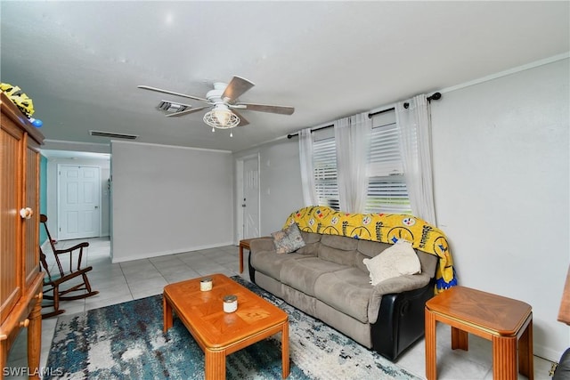 1235 Joerin Ave, North Fort Myers, FL 33903 - tiled living area with baseboards, ceiling fan, and visible vents