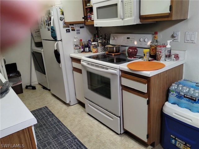 kitchen featuring white appliances