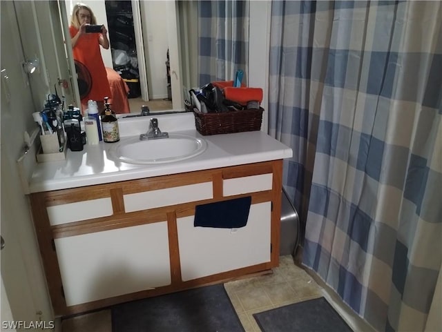 bathroom featuring vanity and tile patterned floors