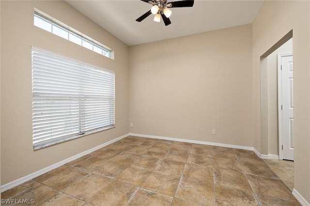 spare room with ceiling fan