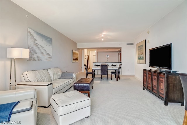 3000 Oasis Grand Blvd Unit 1704, Fort Myers, FL 33916 - living room with carpet flooring and baseboards