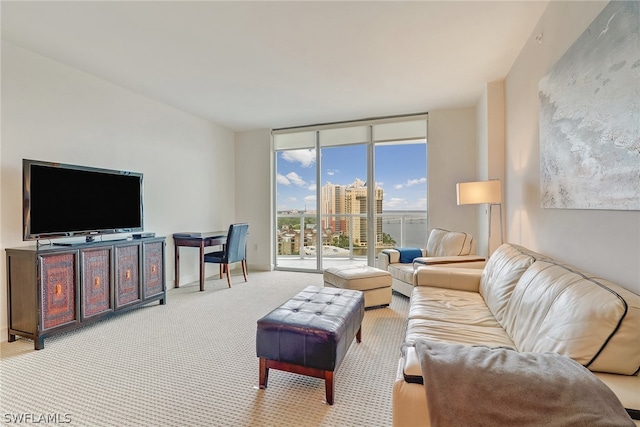 3000 Oasis Grand Blvd Unit 1704, Fort Myers, FL 33916 - living room with floor to ceiling windows and carpet