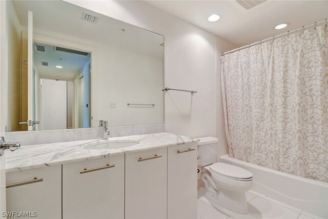3000 Oasis Grand Blvd Unit 1704, Fort Myers, FL 33916 - full bath featuring vanity, shower / tub combo with curtain, recessed lighting, and tile patterned flooring