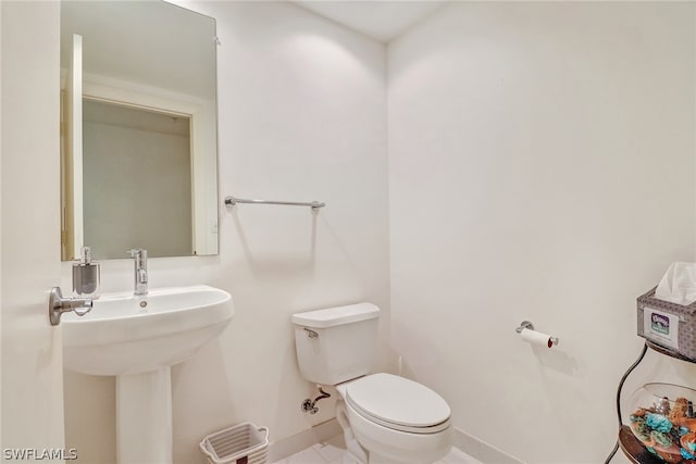 3000 Oasis Grand Blvd Unit 1704, Fort Myers, FL 33916 - bathroom with toilet and tile patterned floors