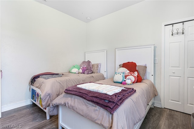 bedroom featuring dark hardwood / wood-style floors