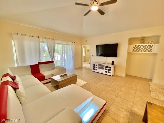 tiled living room with ceiling fan