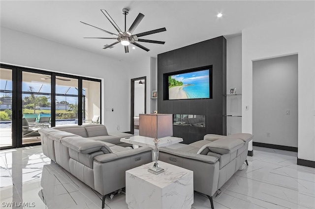 living room featuring ceiling fan