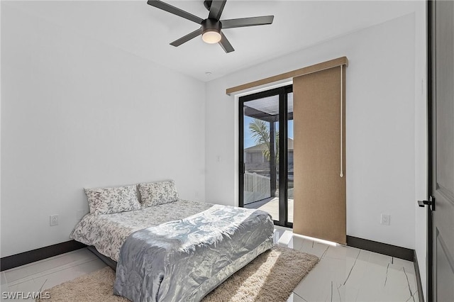 bedroom with multiple windows, access to outside, and ceiling fan