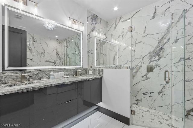 bathroom with vanity and walk in shower