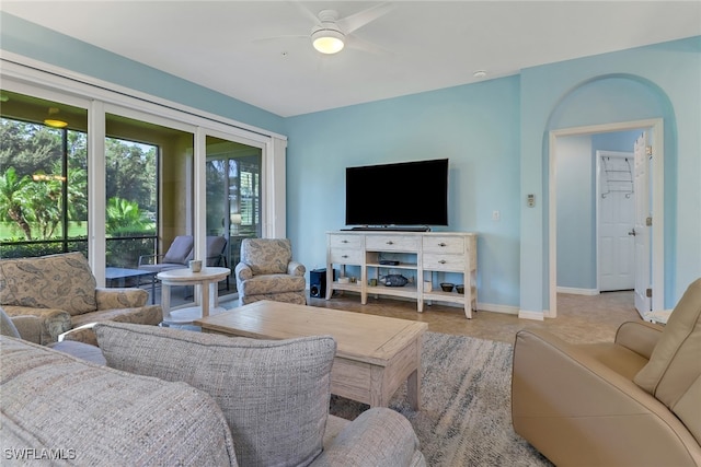 living room with ceiling fan