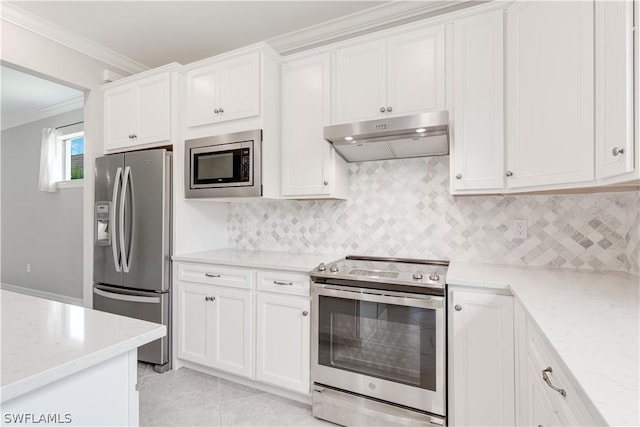 kitchen featuring ornamental molding, stainless steel appliances, white cabinetry, and light stone counters