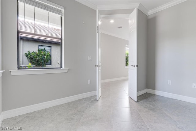 tiled empty room with ornamental molding